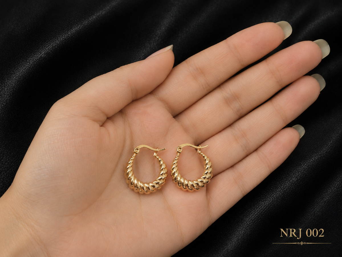 A pair of small gold hoop earrings with a twisted rope texture,